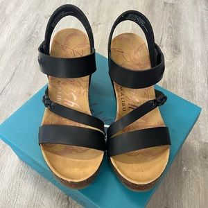 Black women’s Blowfish Malibu wedge sandals